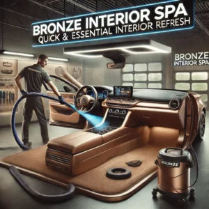 "Bronze luxury car receiving a professional Bronze Interior Spa treatment at Lava GR in Wyoming, MI. A trained detailer vacuums the seats and carpets while another technician wipes down the dashboard and console. The car’s interior is refreshed, dust-free, and streak-free inside a high-end auto detailing facility."