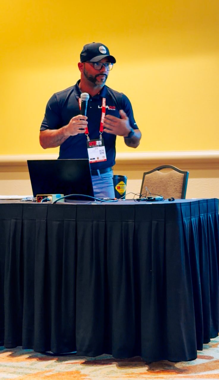 Joseph Stein speaking with industry professionals at the Mobile Tech Expo detailing conference
