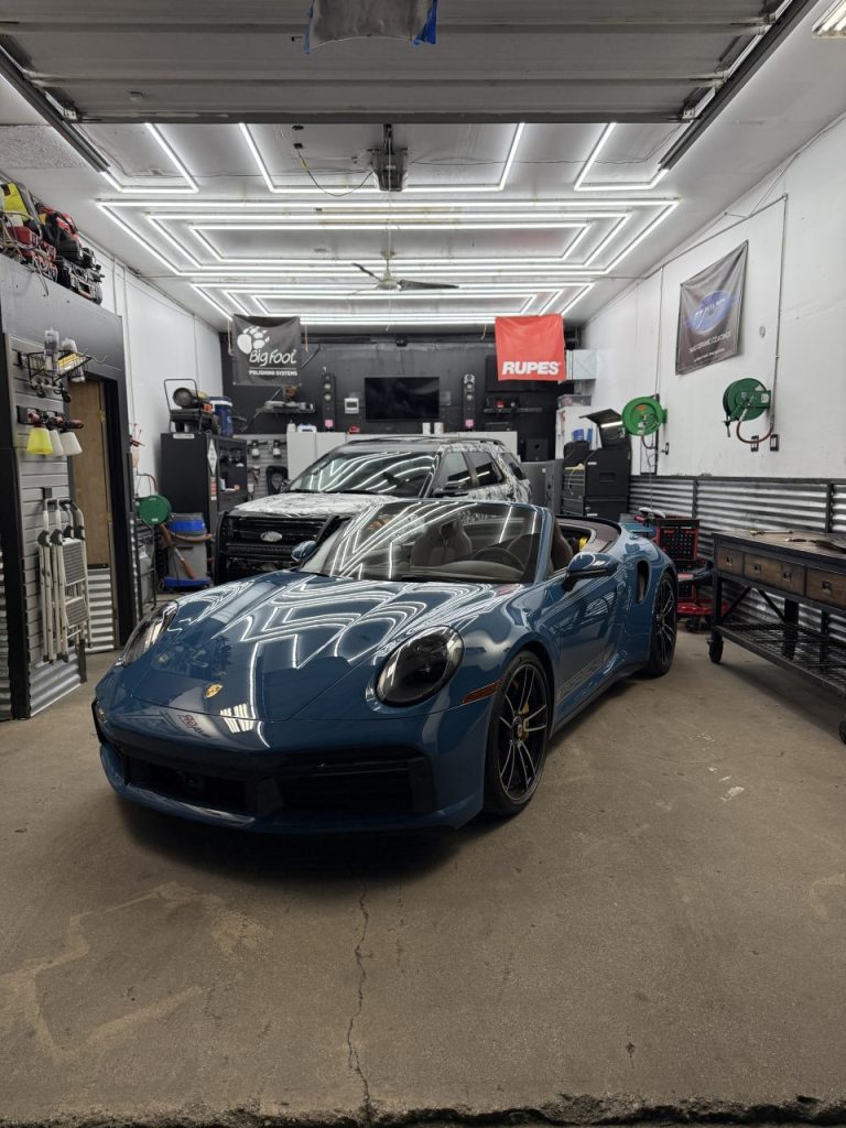 camo vinyl wrapped Ford Explorer detailed at Lava GR Detailing in Grand Rapids Michigan